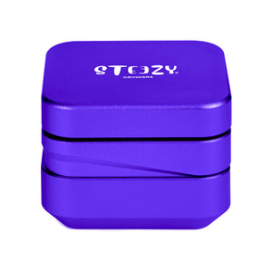 STEEZY® STEEZY® 4+1 | High Class Grinder | 63mm | 4-teiliger Grinder | quadratisch | CNC-gefräste Aluminiumlegierung | Neodym Magnetverschluss | Inklusive Pinsel & Klopfband "Ultra Purple" – Individueller Grinder kaufen | Alternative zu NV Grinder