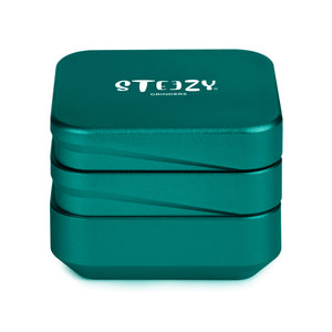 STEEZY® STEEZY® 4+1 | High Class Grinder | 63mm | 4-teiliger Grinder | quadratisch | CNC-gefräste Aluminiumlegierung | Neodym Magnetverschluss | Inklusive Pinsel & Klopfband "Jade Green" – Individueller Grinder kaufen | Alternative zu NV Grinder