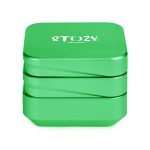 STEEZY® STEEZY® 4+1 | High Class Grinder | 63mm | 4-teiliger Grinder | quadratisch | CNC-gefräste Aluminiumlegierung | Neodym Magnetverschluss | Inklusive Pinsel & Klopfband "Summer Green" – Individueller Grinder kaufen | Alternative zu NV Grinder