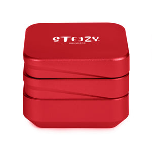 STEEZY® STEEZY® 4+1 | High Class Grinder | 63mm | 4-teiliger Grinder | quadratisch | CNC-gefräste Aluminiumlegierung | Neodym Magnetverschluss | Inklusive Pinsel & Klopfband "Amsterdam Red" – Individueller Grinder kaufen | Alternative zu NV Grinder