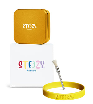 STEEZY® Pocket | High Class Grinder | 55mm | 2-piece Grinder | Square | CNC-machined aluminum alloy | Neodymium magnetic closure | Includes brush & tapping strap "Sunset Gold"